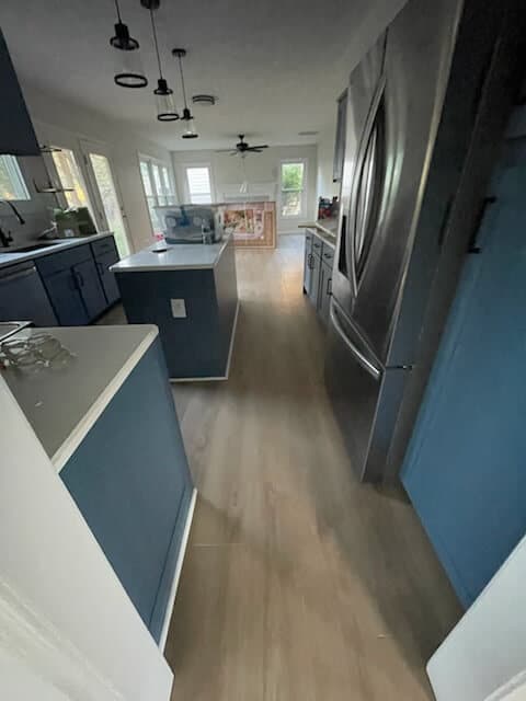 Hallway with hardwood flooring