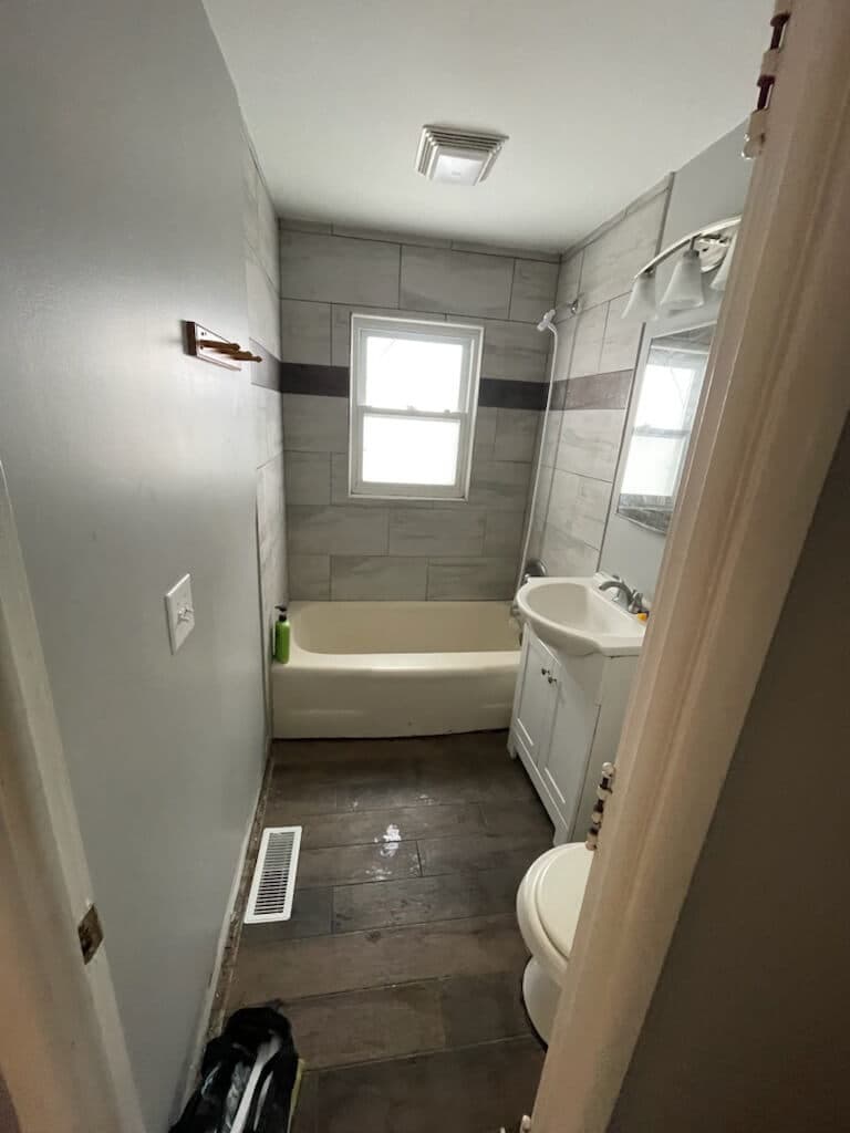 Tile bathroom with shower and vanity