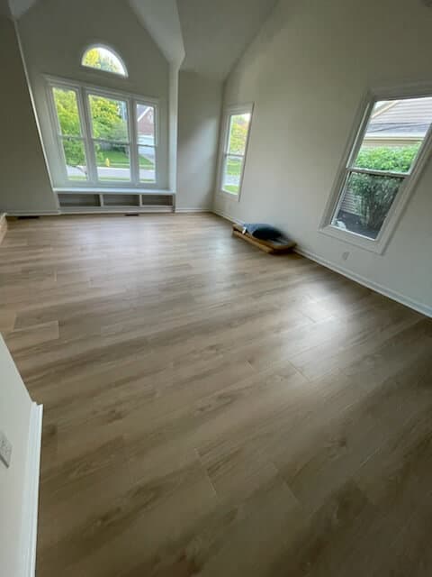Empty room with new hardwood flooring