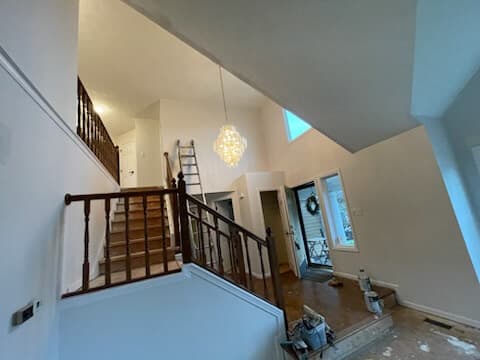 Interior staircase with hardwood flooring